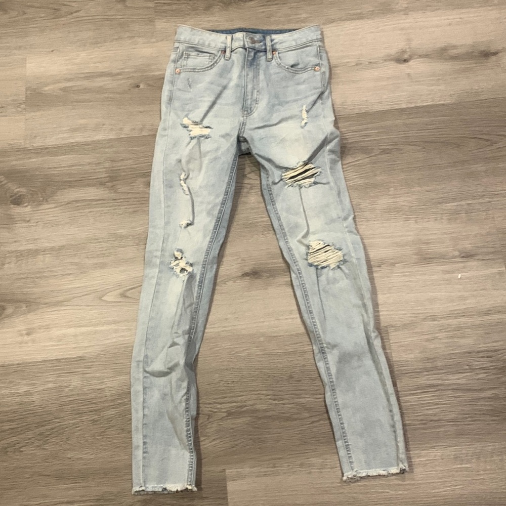 Ripped high rise skinny jeans